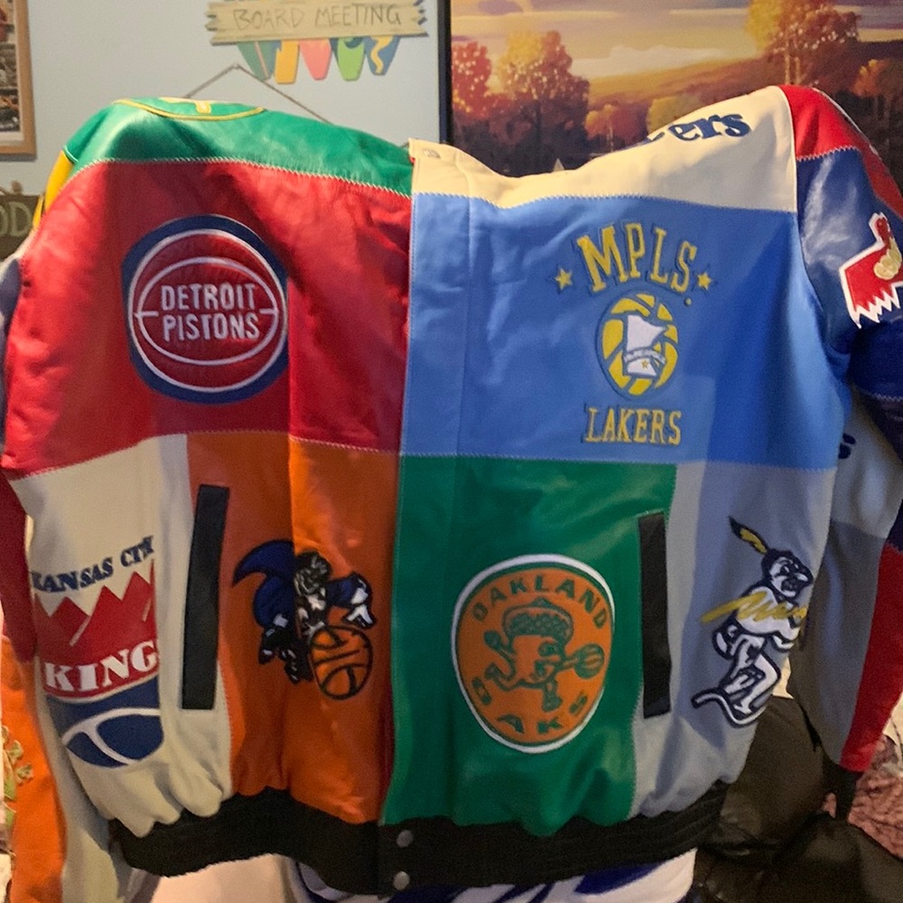 Leather Jacket with patches diferent teams size 4 x  is good deal New